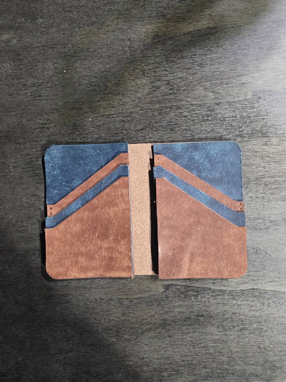 Leather pieces in progress on the STAG workbench